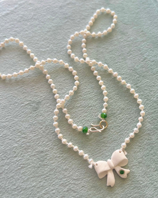 Bow Pendant and Pearl Strand Necklace